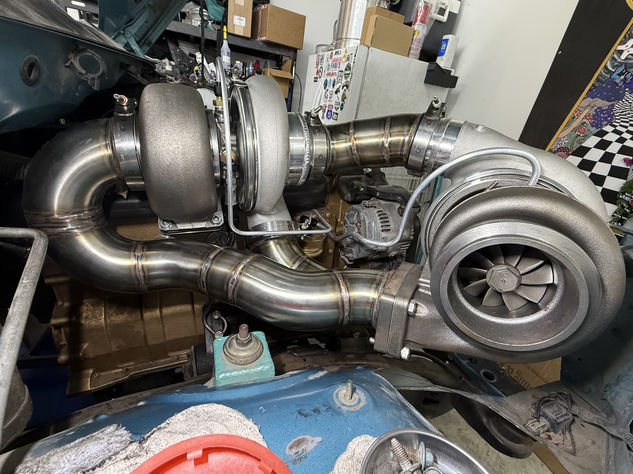 Twin-turbo motor swap with custom stainless piping built by 2 Man Fab
